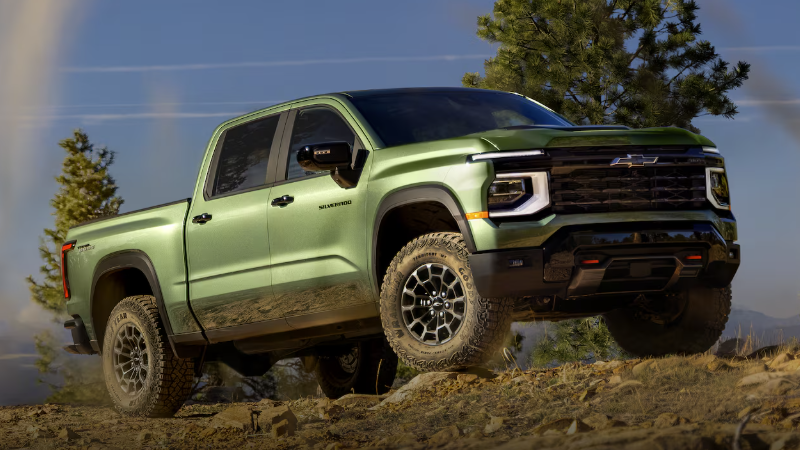 2027 Chevrolet Silverado 1500 driving on rocky terrain